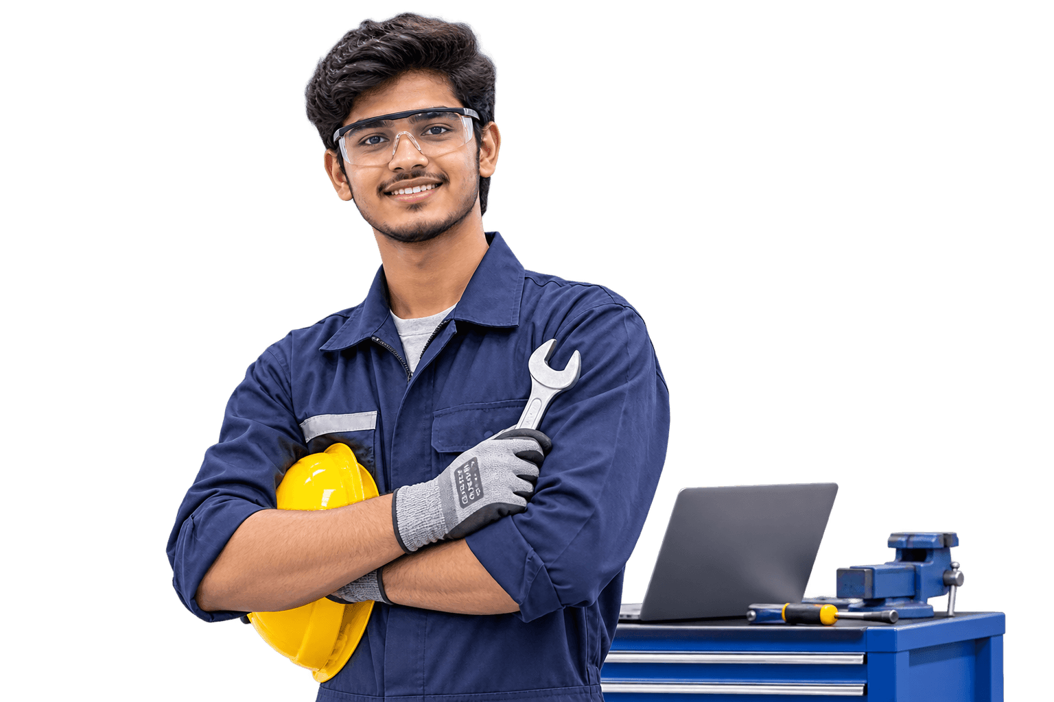 Skilled ITI technician in safety gear holding a wrench beside a workbench